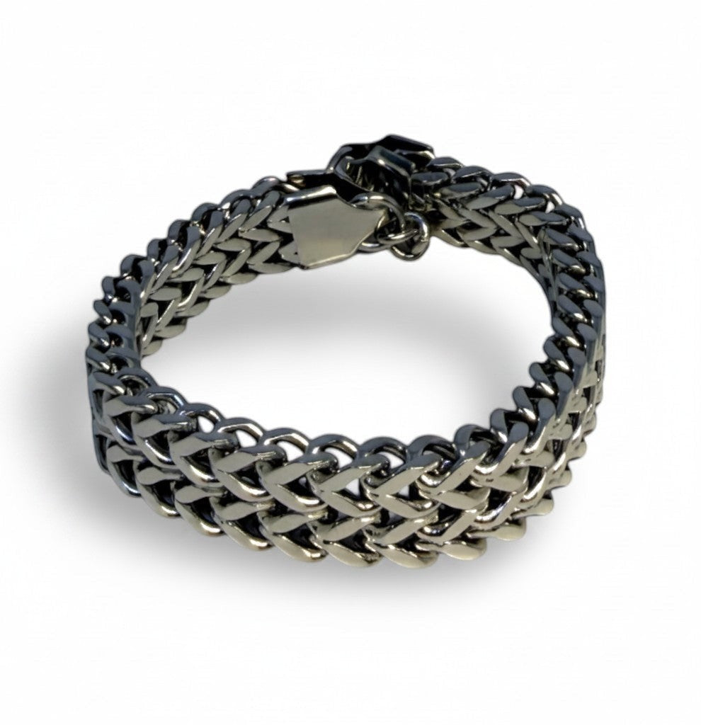 Bracelet Indomptable Majoa en acier inoxydable argenté avec double maille entrelacée et fermoir sécurisé