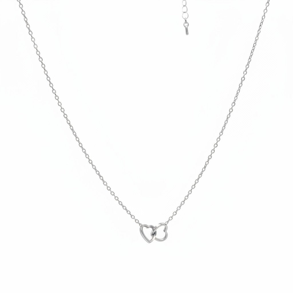 Majoa gold interlocking hearts necklace. Minimalist, elegant, and water-resistant.