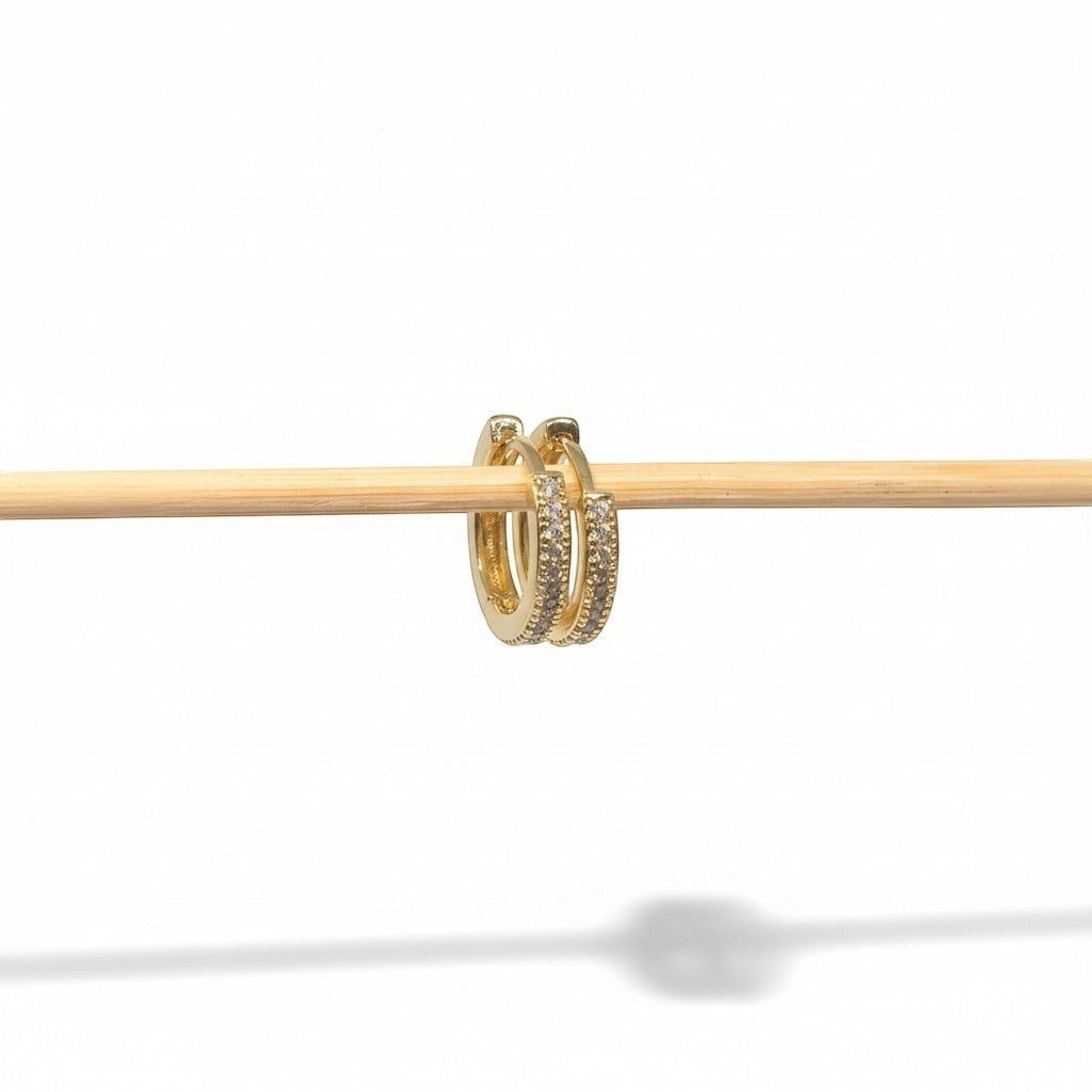 Majoa gold mini hoop earrings paved with clear cubic zirconia stones for everyday sparkle.