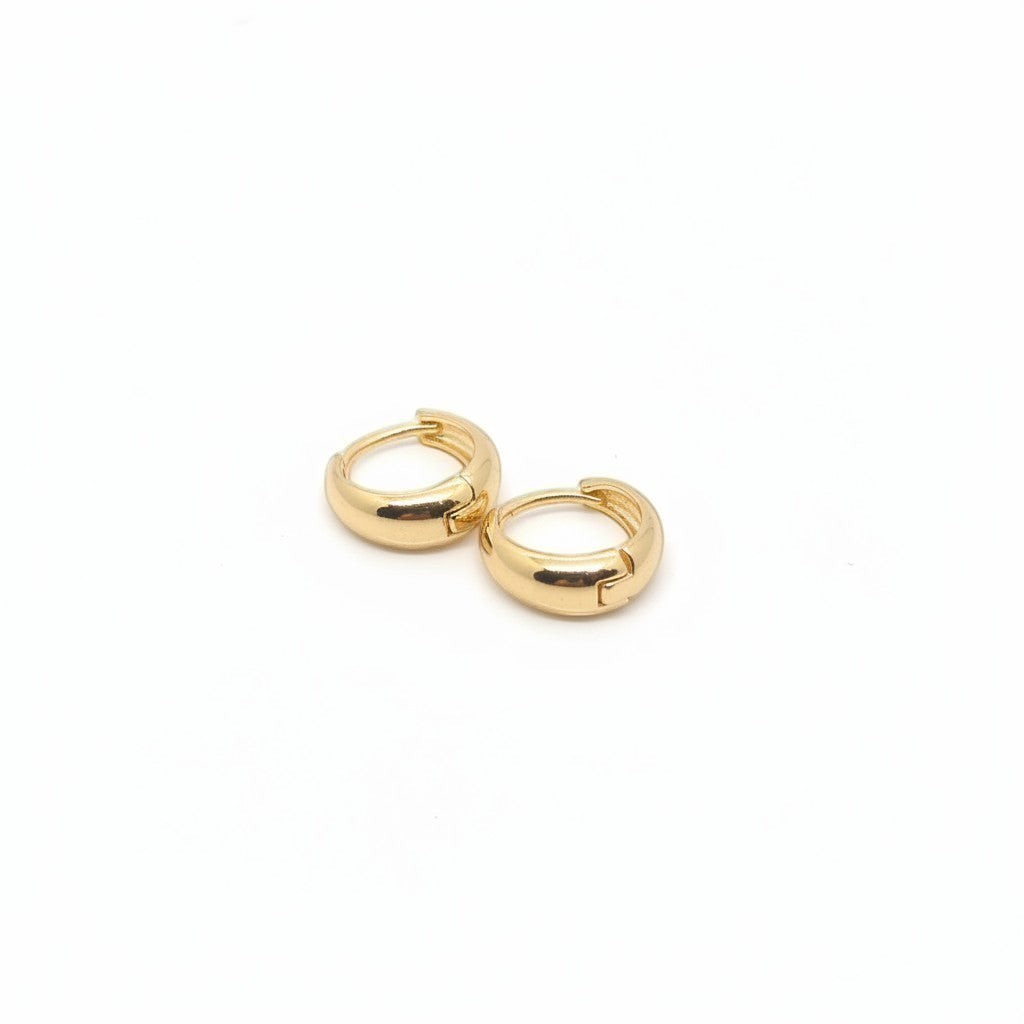 Majoa gold mini hoop earrings, essential everyday jewelry with a sleek, rounded design that catches the light.