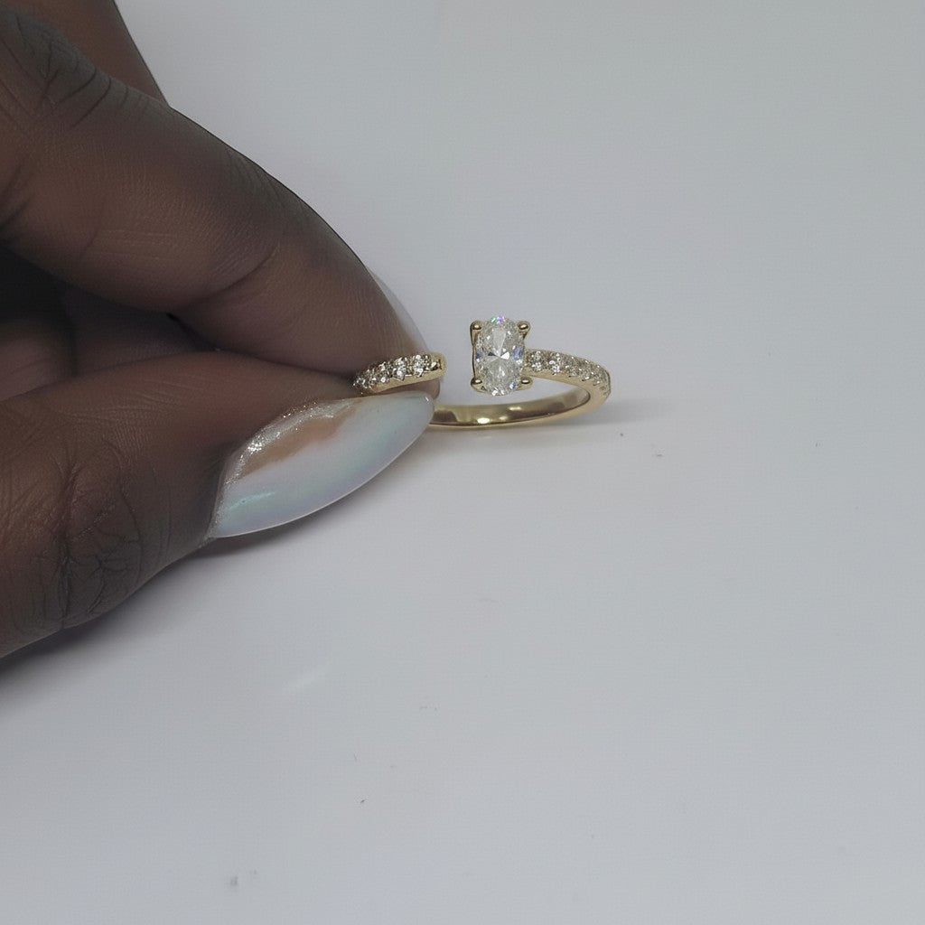 Majoa AURA ring in 925 silver with oval center stone and pave diamond band.