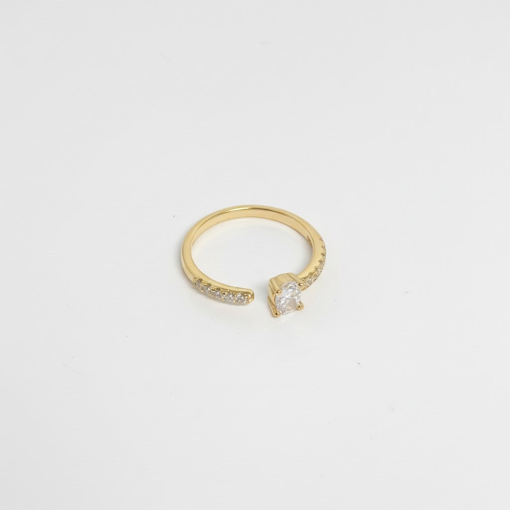 Majoa AURA ring in 925 sterling silver with a central clear stone and small accent stones.