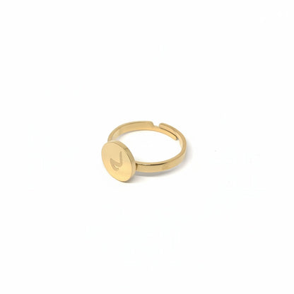 Majoa gold stainless steel ring with a round medallion engraved with an Arabic letter, adjustable band, minimalist design.