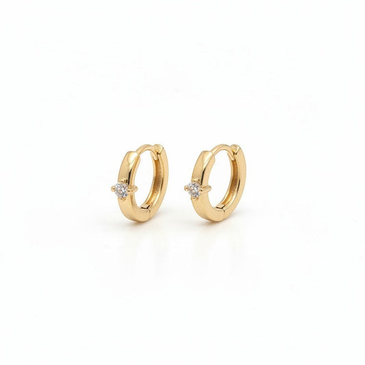Majoa gold mini hoop earrings with a small clear stone accent. Elegant, minimalist design.