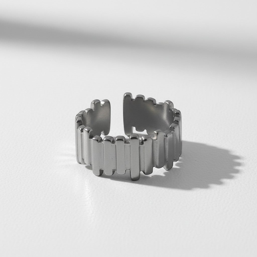 Majoa Rempart steel ring with a segmented, architectural design. Unisex, modern statement jewelry.