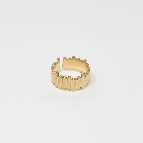 Majoa gold-tone stainless steel ring with a segmented, architectural design. Unisex.