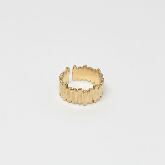 Majoa gold-tone stainless steel ring with a segmented, architectural design. Unisex.